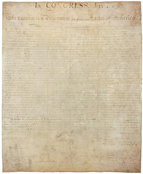 The aged parchment Declaration of Independence, with its heading, handwritten text and signatures.